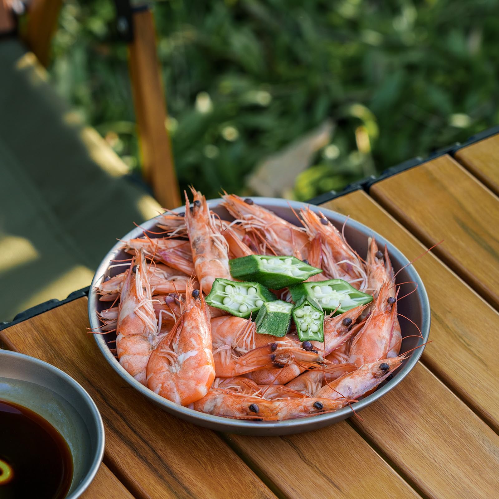 Boundless Voyage plate serving sandwiches and salads on outdoor meals.