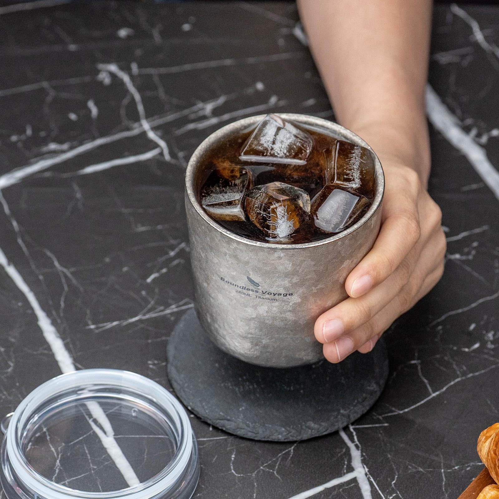 Boundless Voyage Tritan lid detail highlighting BPA/BPS-free material and quiet travel.