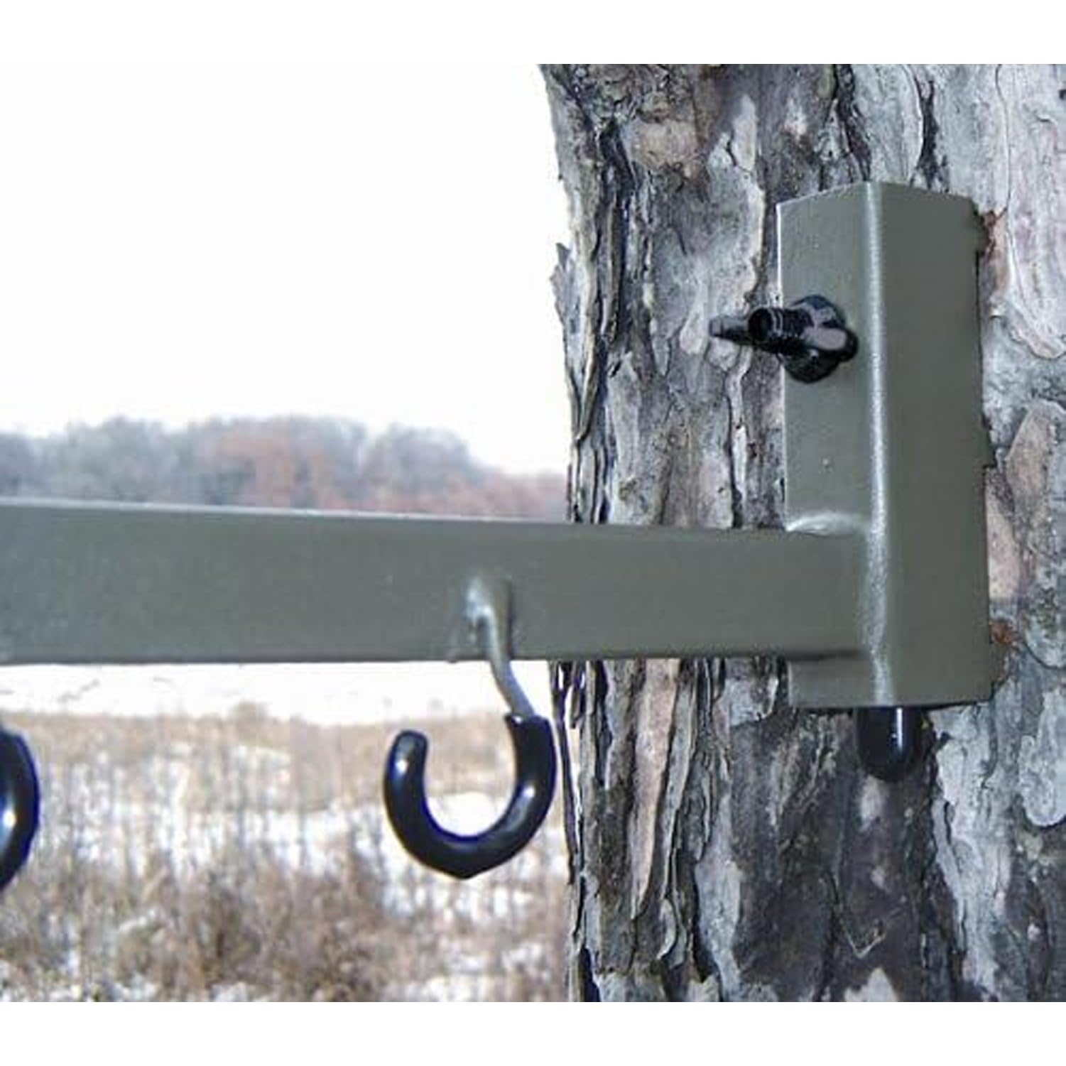 Bow hanger with two accessory hooks attached to a tree stand