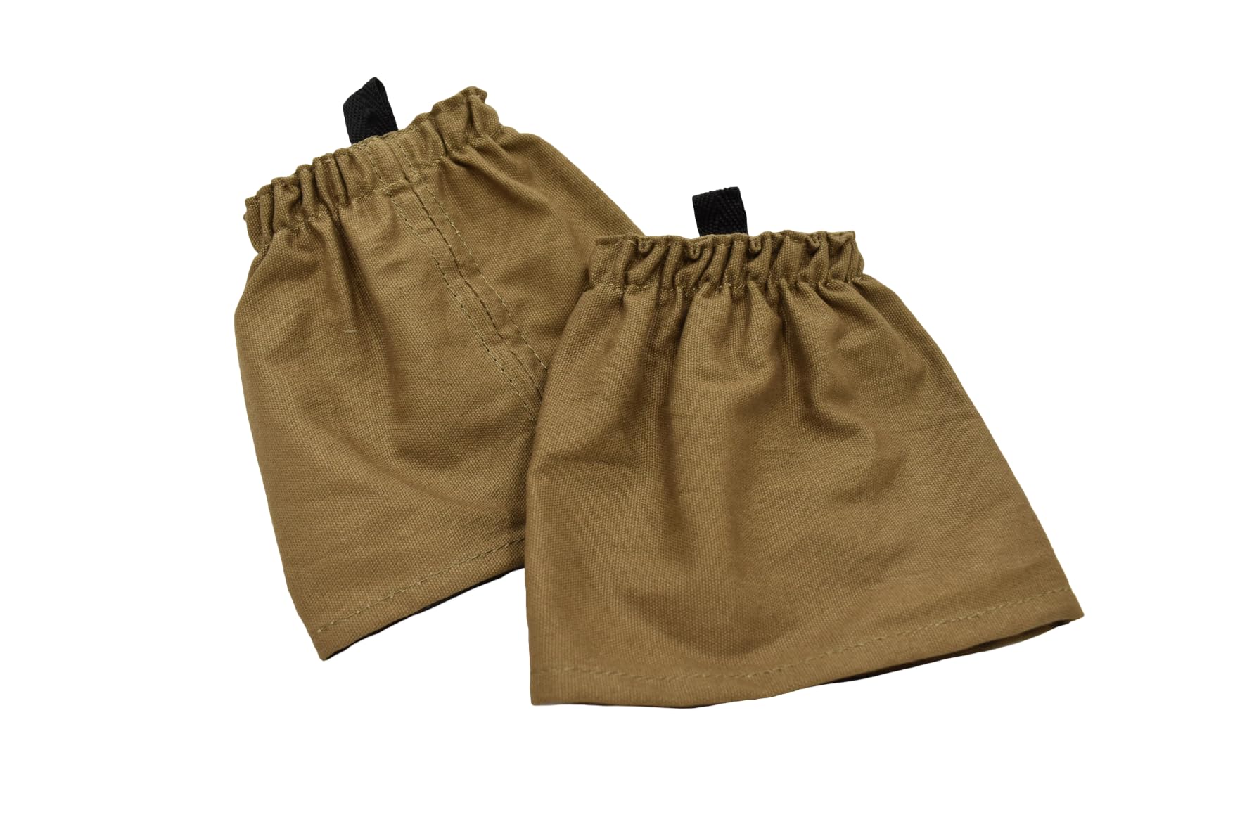 Boyt Harness canvas gaiters in tan blocking debris from boots during rugged use.