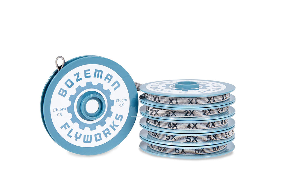 Bozeman FlyWorks 4X fluorocarbon tippet on a spool, ready for versatile rigs and strong knots.