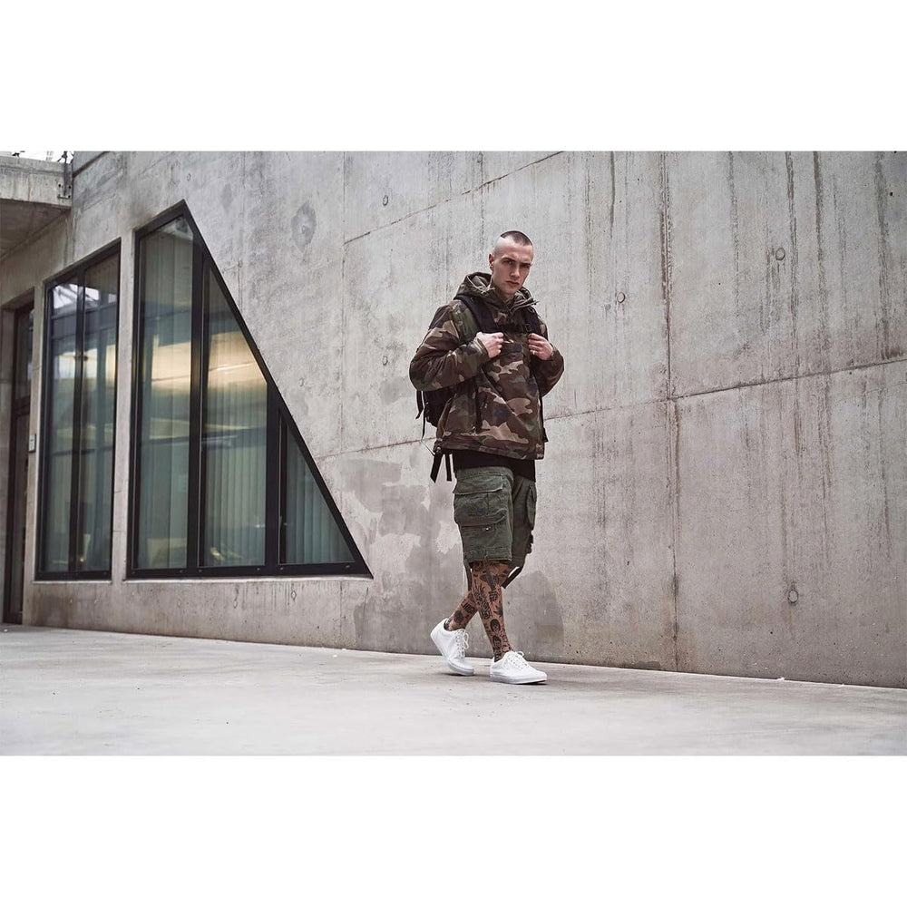Brandit Individual Wear woodland windbreaker hood detail emphasizes fleece-lined snorkel hood for warmth.