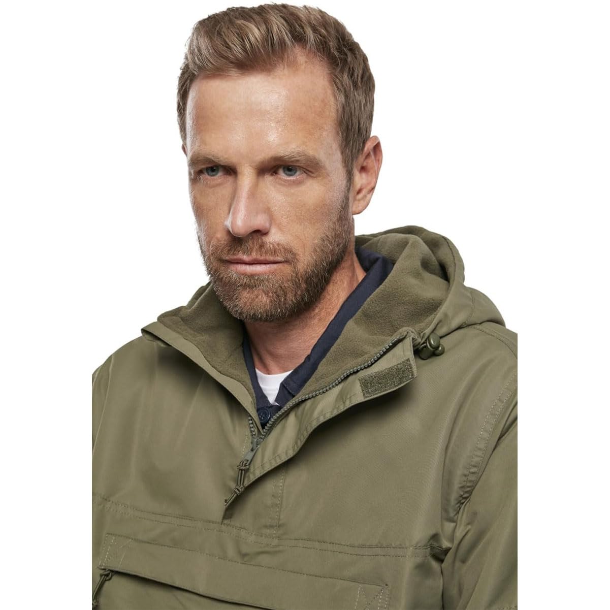 Brandit windbreaker adjustable hood drawstring shows flexible protection in changing weather.