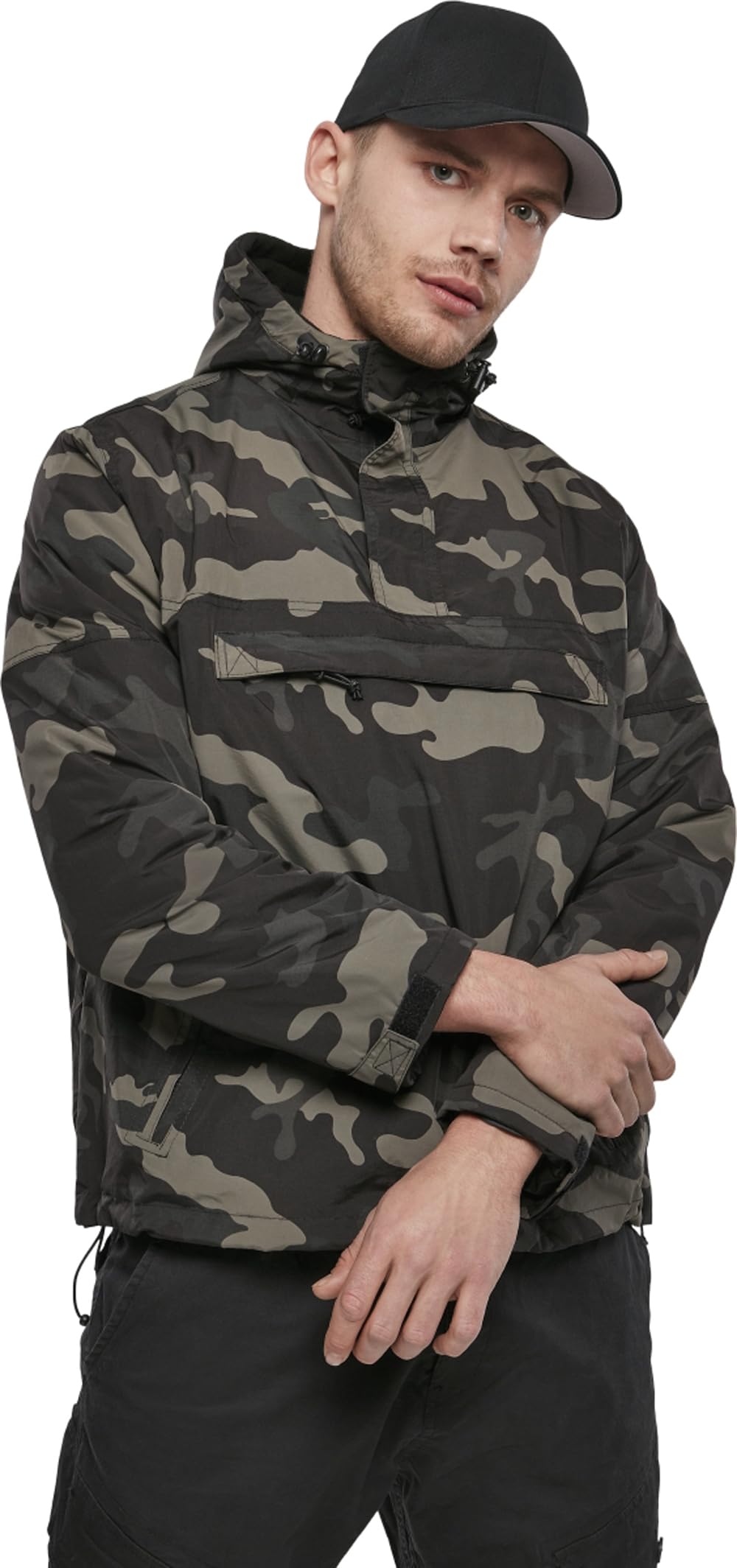 Brandit windbreaker pockets zippered closeup demonstrates secure storage during outdoor activities.