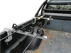 Brocraft aluminum clamp-on rod holder mounted in a truck bed
