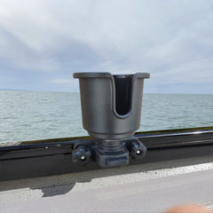 Brocraft cup holder mounted on Crestliner Suremount track for secure beverage access