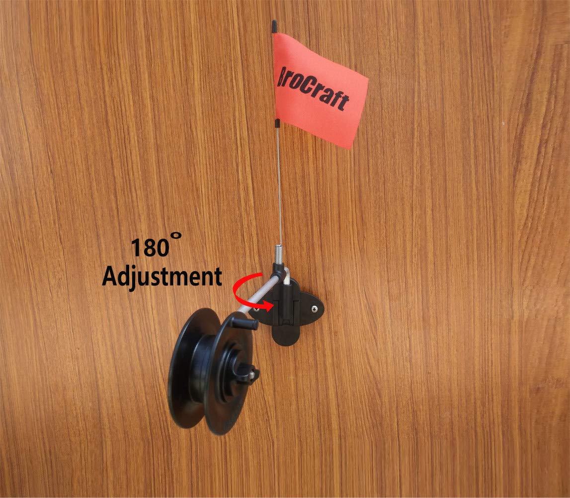 Close-up of the rattle reel mechanism mounted on the wall