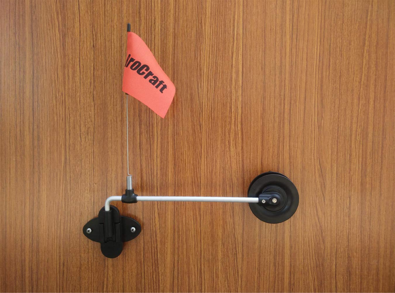 Rattle reel mounted inside an ice fishing house for permanent setup