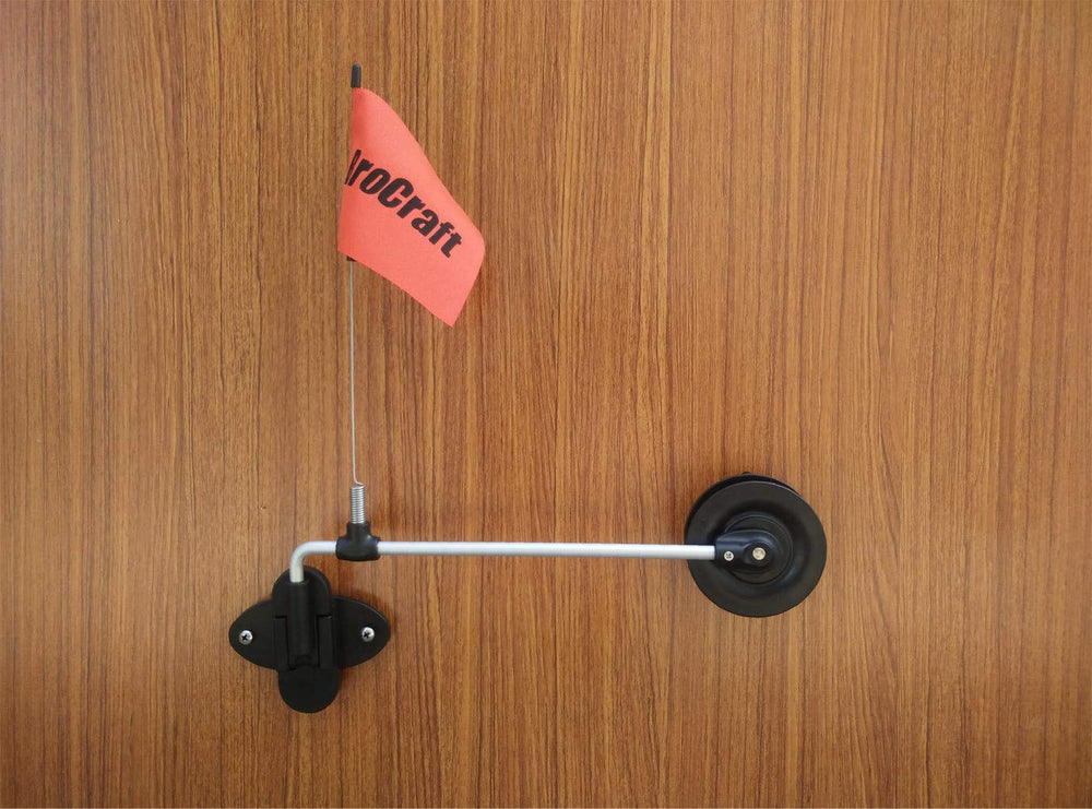 Rattle reel mounted inside an ice fishing house for permanent setup