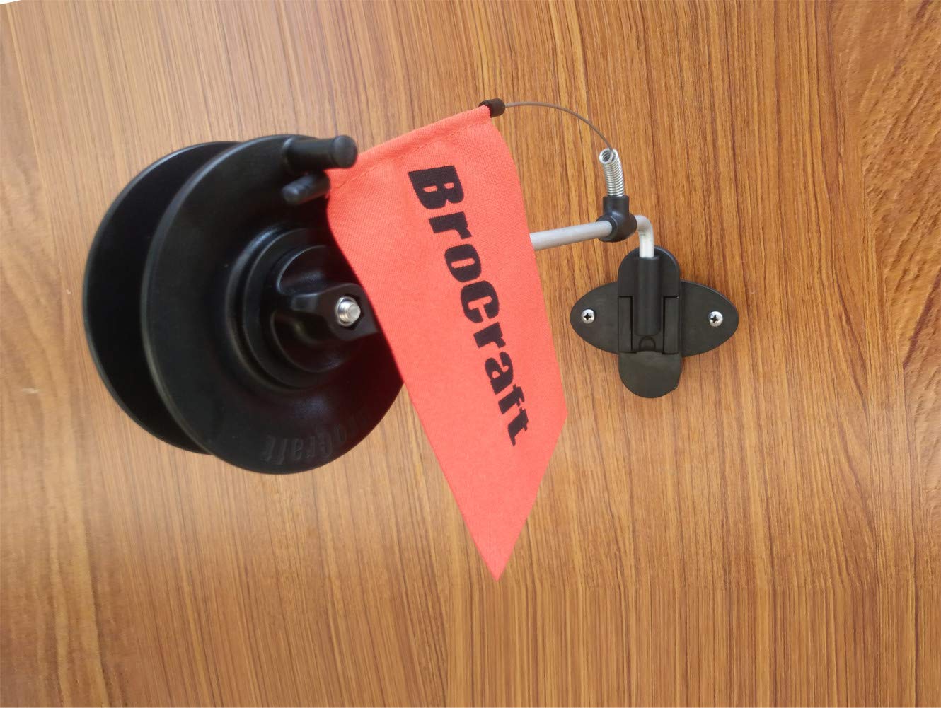 Side view of the Brocraft rattle reel and wall bracket