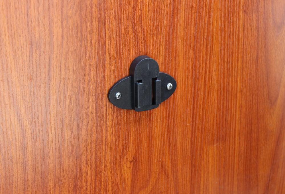 Ready-to-use ice fishing rattle reel wall mount in a shanty interior