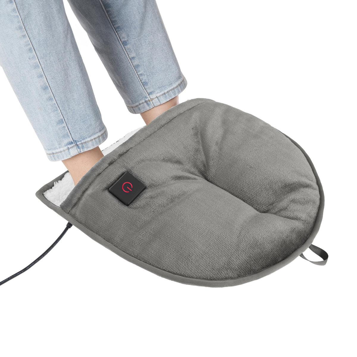 Brookstone Electric Foot Warmer with plush sherpa lining delivers luxurious cozy warmth at home.