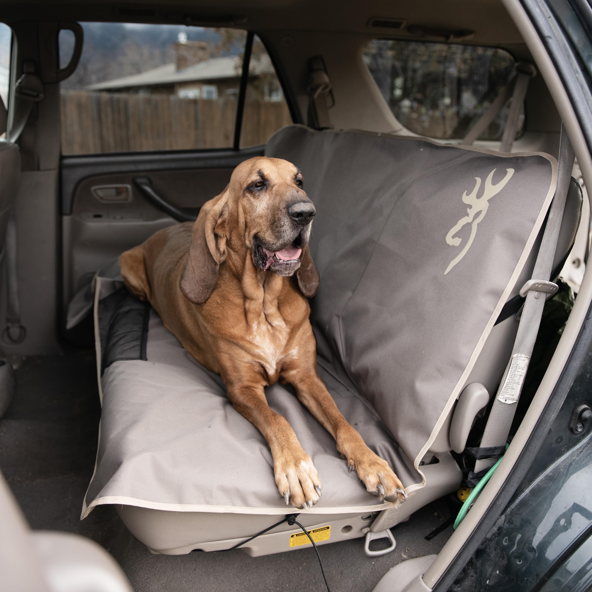 Backseat area showing fit and dimensions 58W x 51H of Browning cover