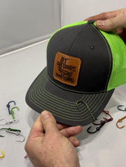 BT Outdoors camo hat hook attached to cap bill for secure use