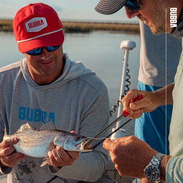 BUBBA in-use image shows safe, effective removal on a fish.