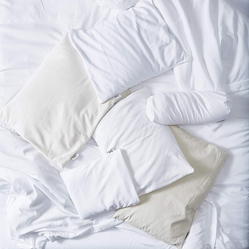 Bucky pillow in bed demonstrates neck and head support for comfortable alignment.