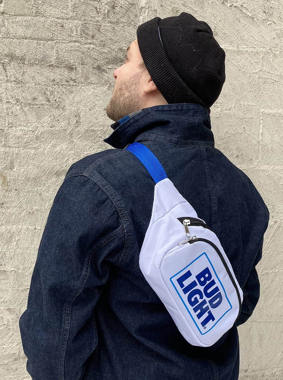 Front zip pocket on Bud Light fanny pack stores essentials securely during events.