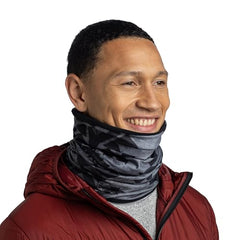 Buff Polar neckwarmer worn by a woman demonstrates comfortable fit.