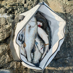 Buffalo Gear insulated fish bag cooler interior showing ice for freshness.