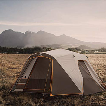 Bushnell Instant Tent family camping scene at sunset for versatile 3-season use.