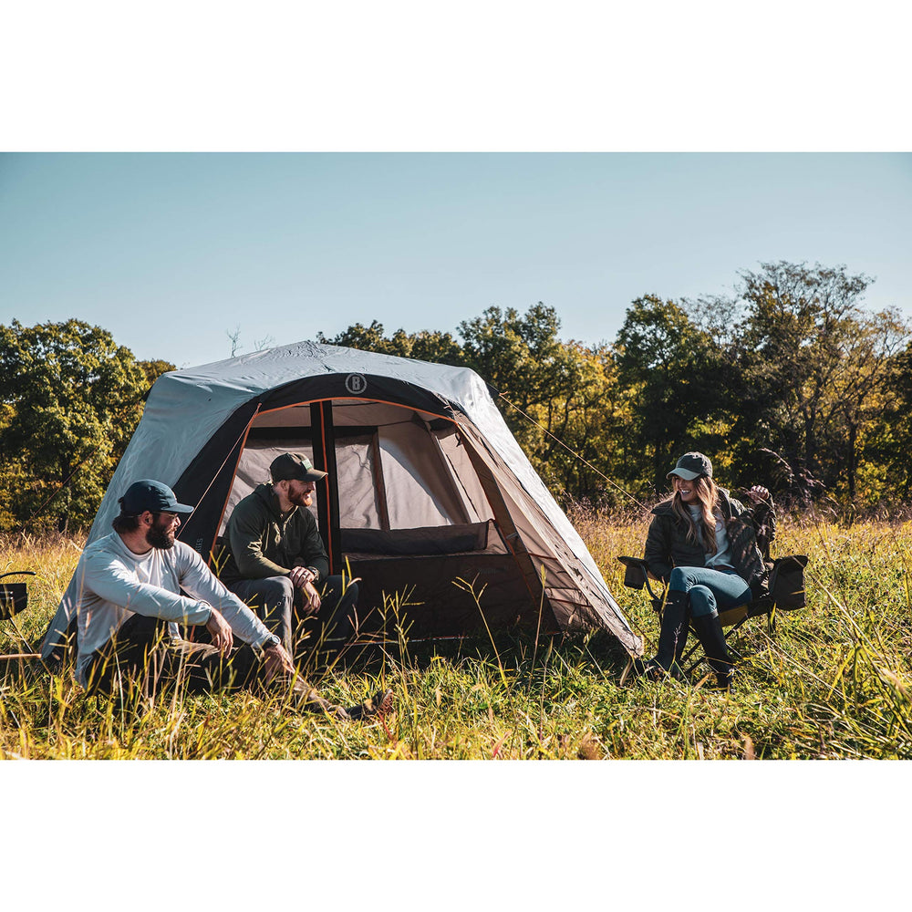 Bushnell Instant Tent weather shield protects gear during rain and wind.