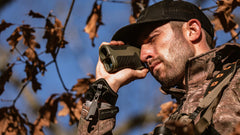 Bushnell R3 rangefinder demonstrates 1200-yard capability for long-distance readings.