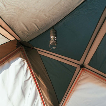 Bushnell electrical port lets you power small devices while keeping bugs out.