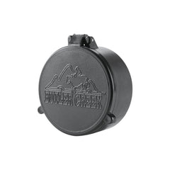 Butler Creek 48 objective flip-open cover closed protects optics in rugged field use.
