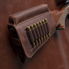Buttstock cartridge carrier holding seven rounds