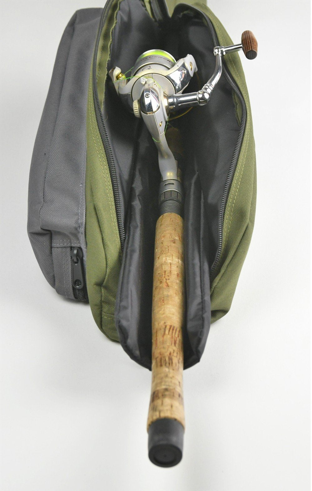 BW Sports RC-5060 rod and reel case interior shows padded reel section for safe storage