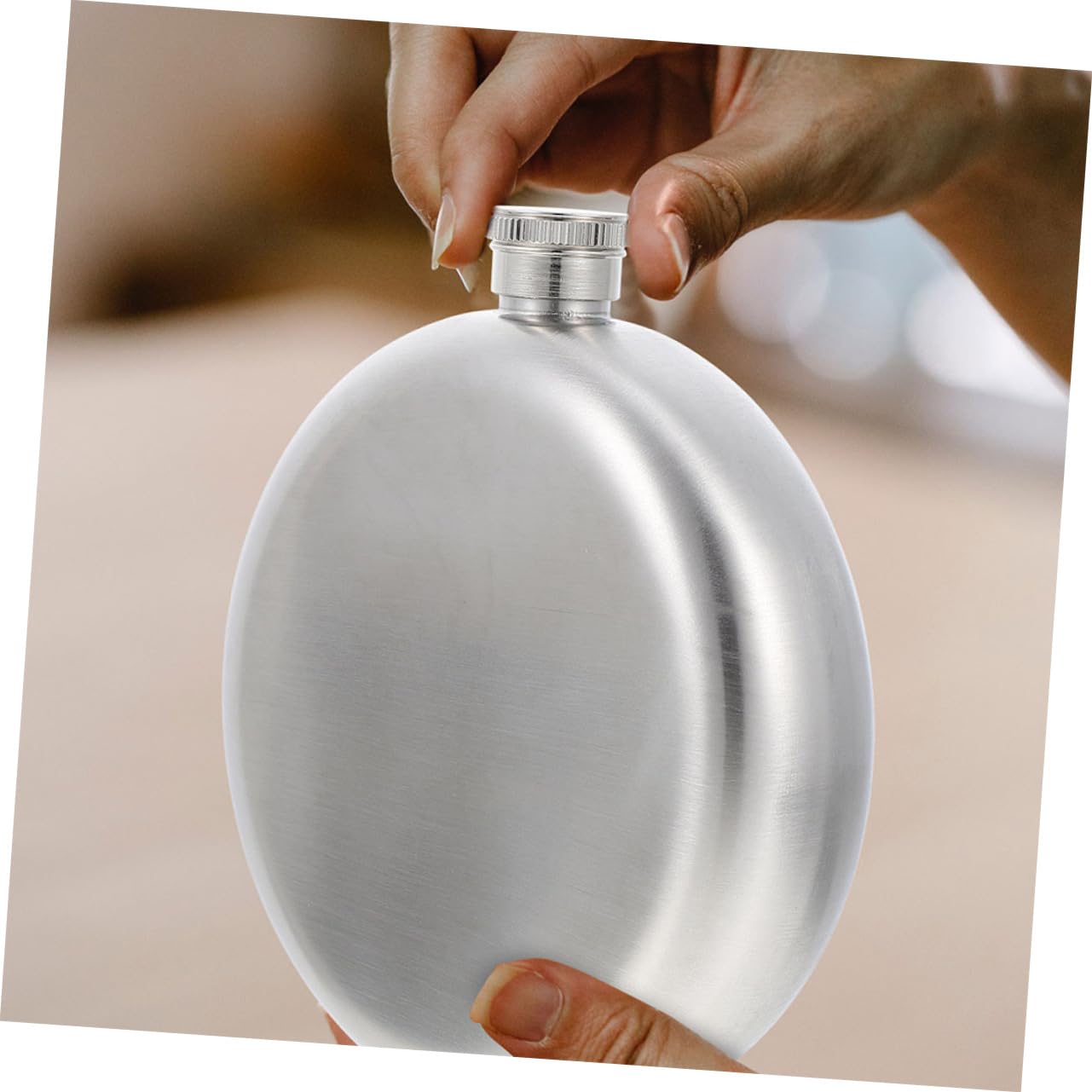 Cabilock compact flask for hiking and fishing, fits in a pocket.