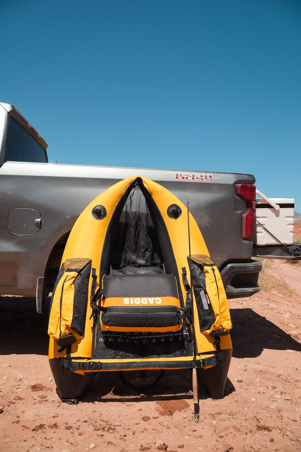 Integrated rod holder and storage pockets