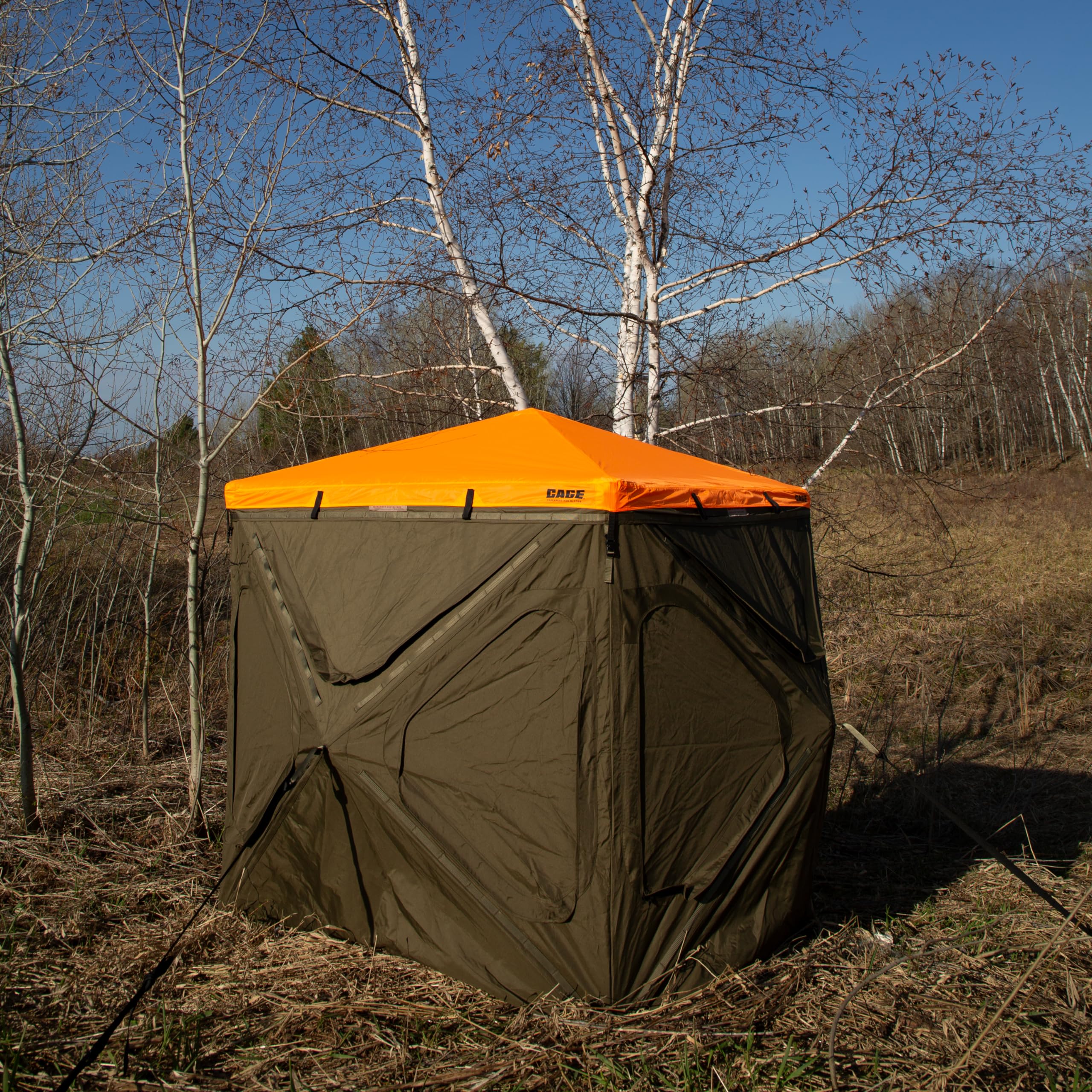 CAGE Blaze Orange Safety Cap secured by clips on four corners for quick perimeter setup