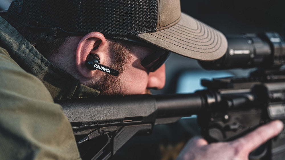 Caldwell E-MAX Shadows 23 NRR reduces ambient noise while keeping surroundings audible.