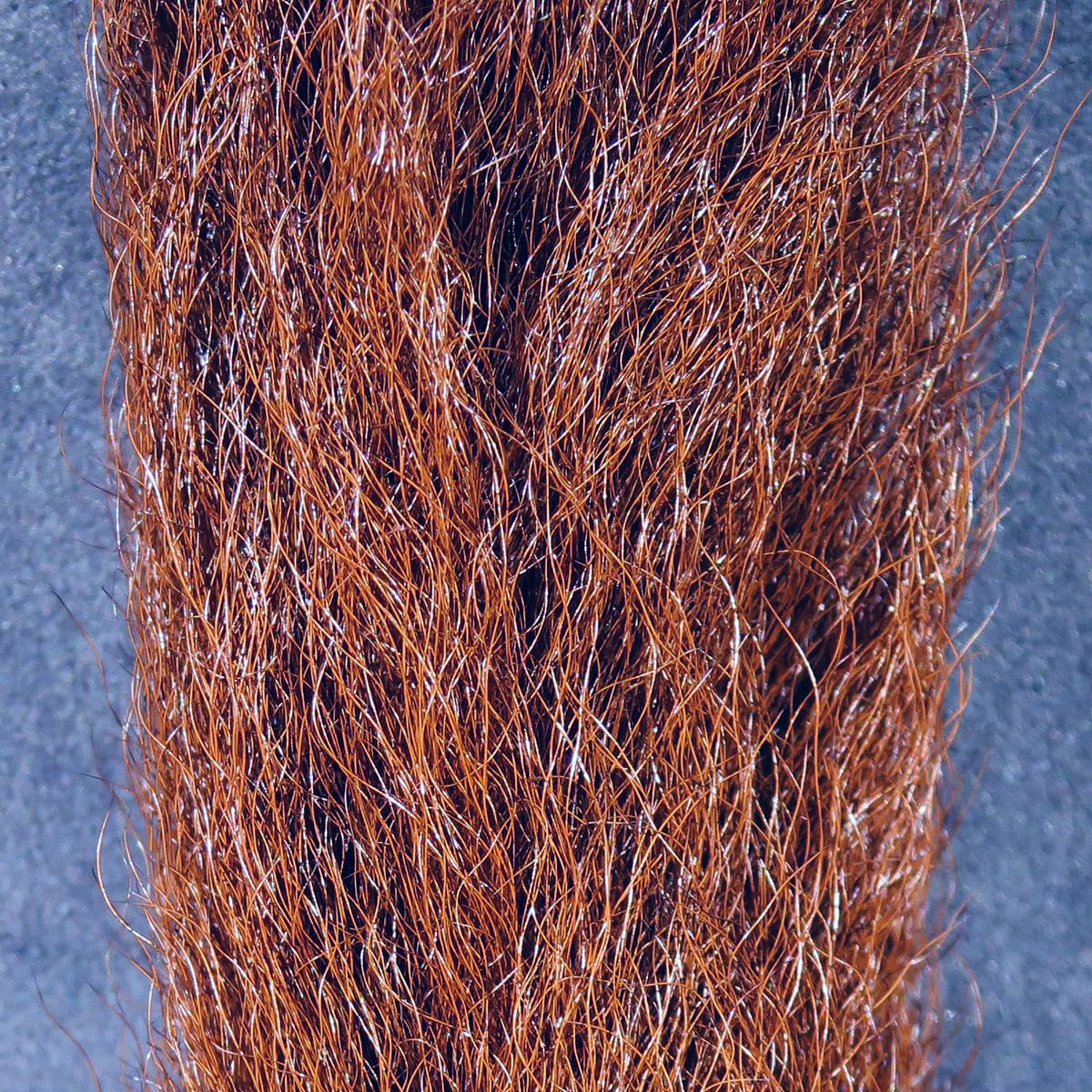 Calf Tail Seal Brown closeup shows crinkly hair ideal for wings