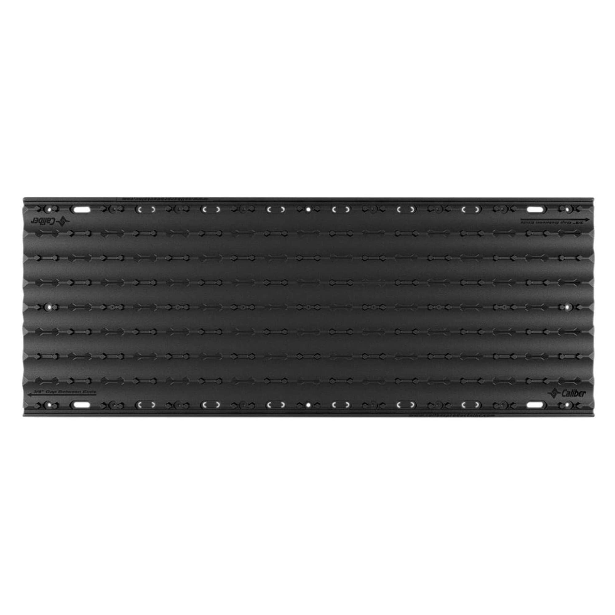 Caliber Lowpro Grip Glides four-pack laid on a trailer deck for versatile powersport loading.