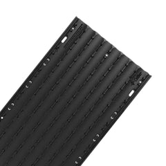 Caliber Lowpro Grip Glides close-up on textured grip for controlled loading and unloading.