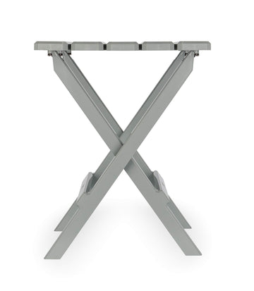 Camco 51692 gray Adirondack side table folded for compact storage after a sunny picnic.