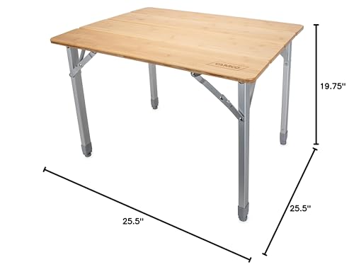 Camco bamboo table folded in its storage bag for convenient transport