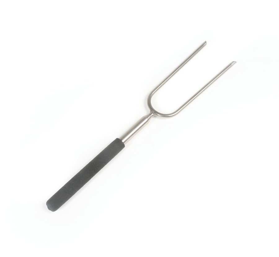 Camco extended 34-inch roasting fork ready for campfire cooking