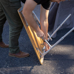 Camco adjustable-height table (18–26 inches) supports flexible outdoor use.
