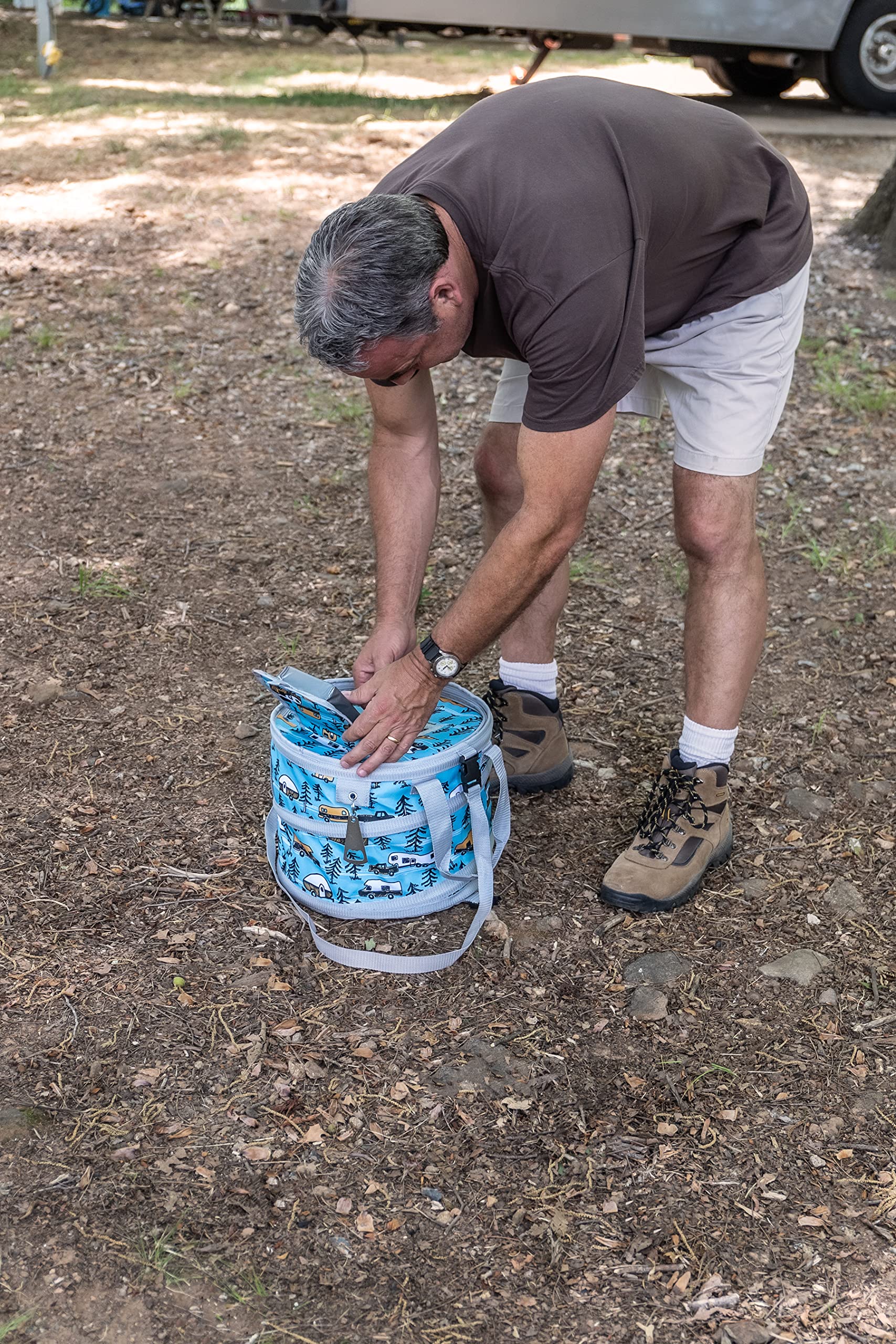 Camco Pop-Up Cooler with carry handles and shoulder strap for portability.