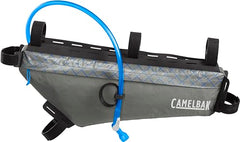 CamelBak M.U.L.E. water-resistant pocket protecting essentials in wet conditions.