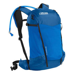 CamelBak Rim Runner X22 front view in True Blue highlighting quick-access pockets for day hikes.