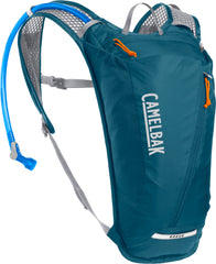 CamelBak Rogue Light 7 pack on trail for fast hydration and mobility.