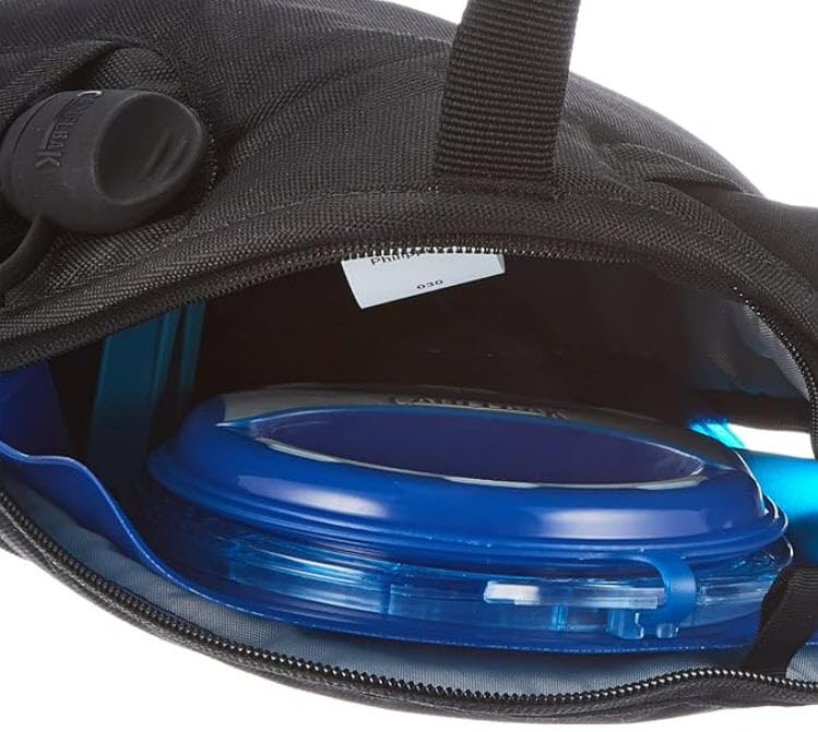 CamelBak Stoaway mounted on a pack during hiking use