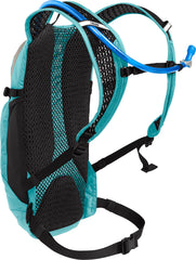 CamelBak Women's Lobo 9 helmet carry demonstrates hands-free gear access during rides.