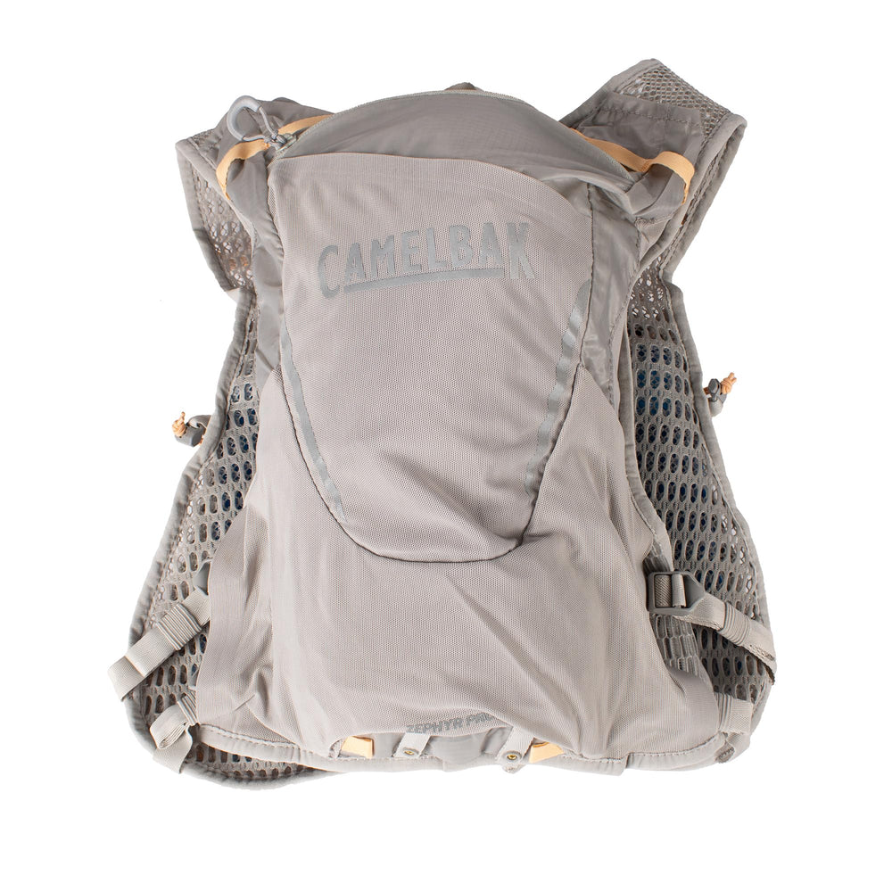CamelBak women's Zephyr Pro vest with trekking pole quiver in action