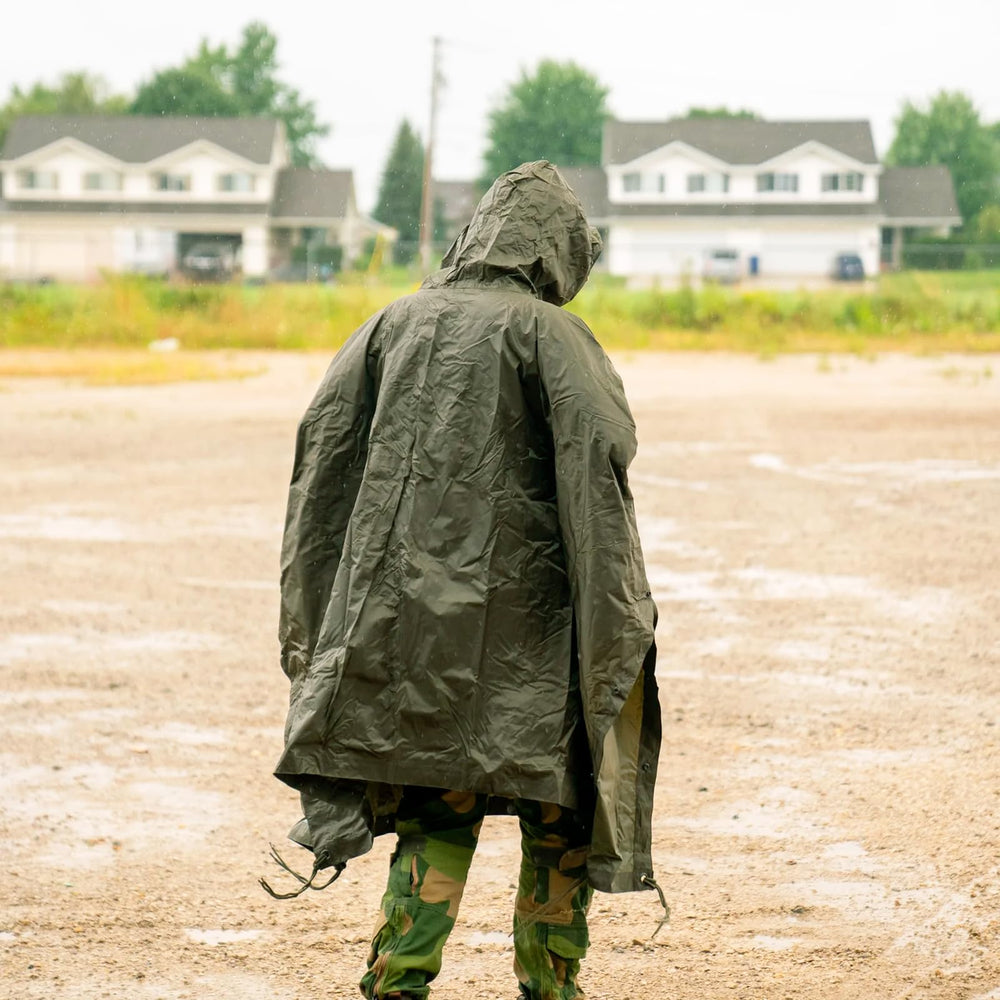 CamoOutdoor Mil-Tec poncho bivy-sack-use shows emergency shelter capability in survival situations.