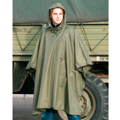 CamoOutdoor Mil-Tec poncho tarp-setup demonstrates versatile shelter option in rugged weather.